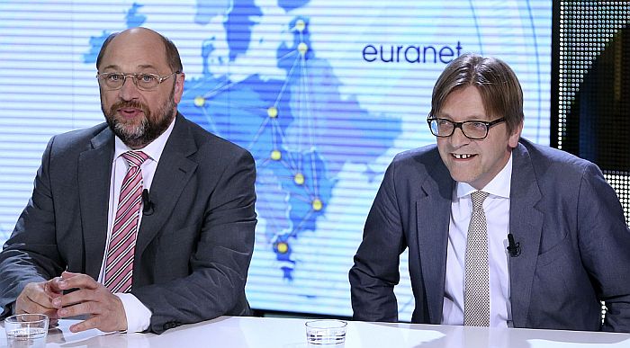 Candidates for the presidency of the European Commission Martin Schulz of the Party of European Socialists (L) and Guy Verhofstadt of the Alliance of Liberals and Democrats for Europe Party attend a debate on the European Presidential election at the European Parliament in Brussels April 29, 2014. REUTERS/Francois Lenoir (BELGIUM - Tags: POLITICS)
